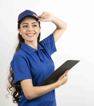 A portrait of a delivery young woman with clipboard . High quality photo